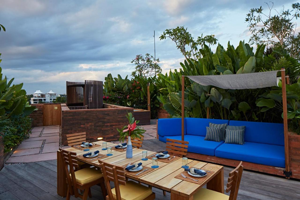 Potato Head Suites & Studios Семиньяк Экстерьер фото The rooftop bar at the hotel