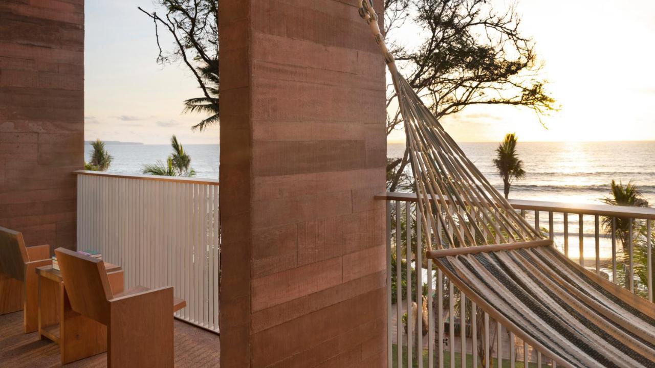 Potato Head Suites & Studios Семиньяк Экстерьер фото A monolith at the beach